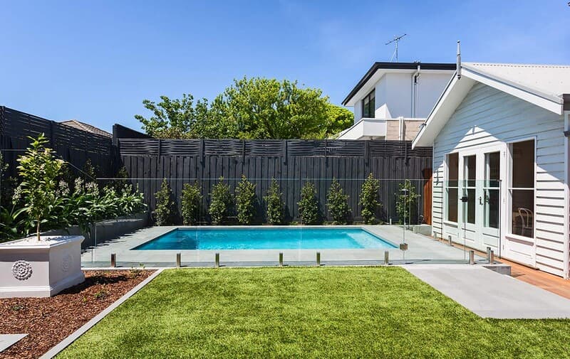 Luxury poolside landscaping with entertainment areas and premium finishes in Sydney