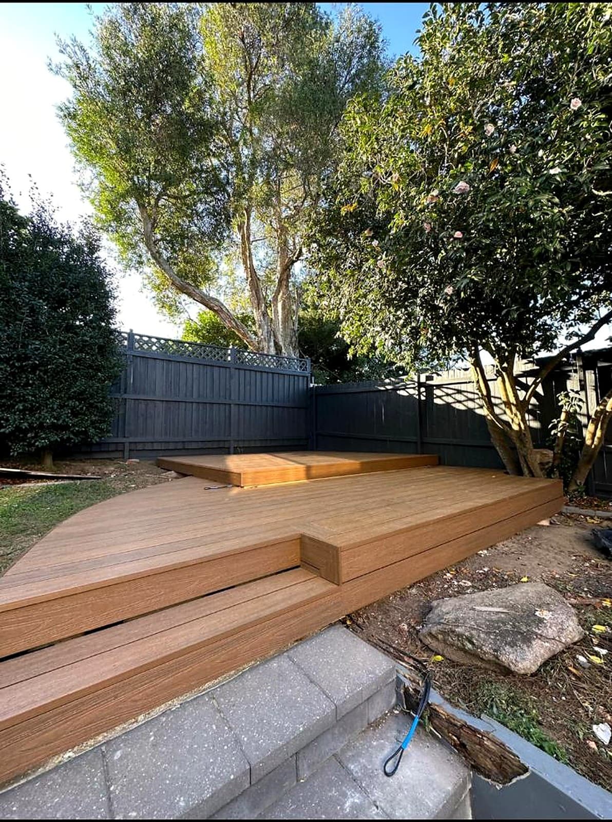 Finished raised timber deck adjoining the outdoor living area in Lane Cove by Nazscapes
