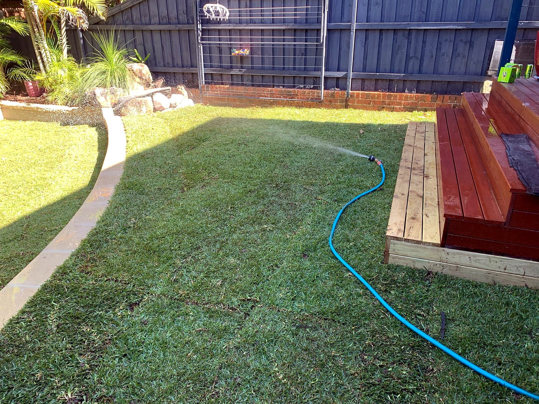 Finished backyard lawn and timber deck area in Mona Vale by Nazscapes